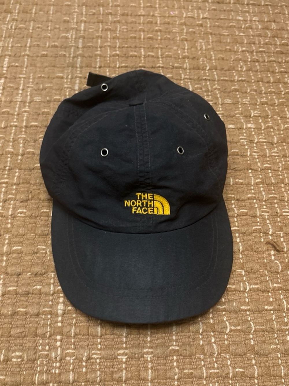 The North Face Navy Cap with Yellow Logo